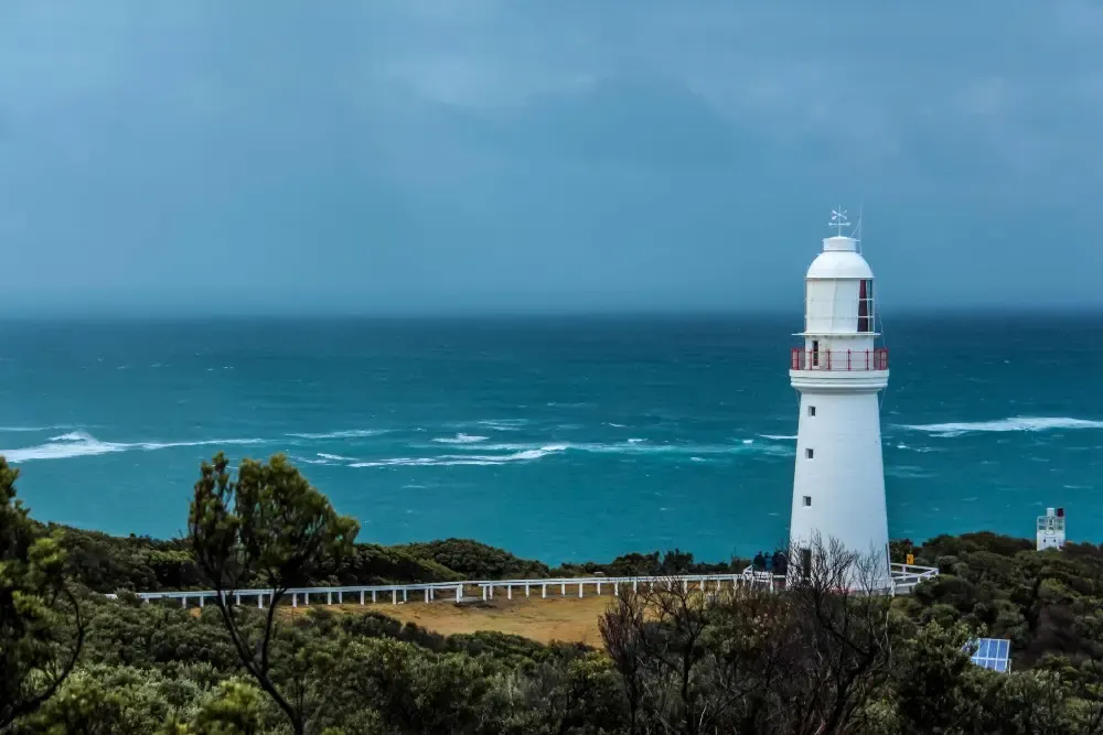 Lighthouse at the coast of the ocean