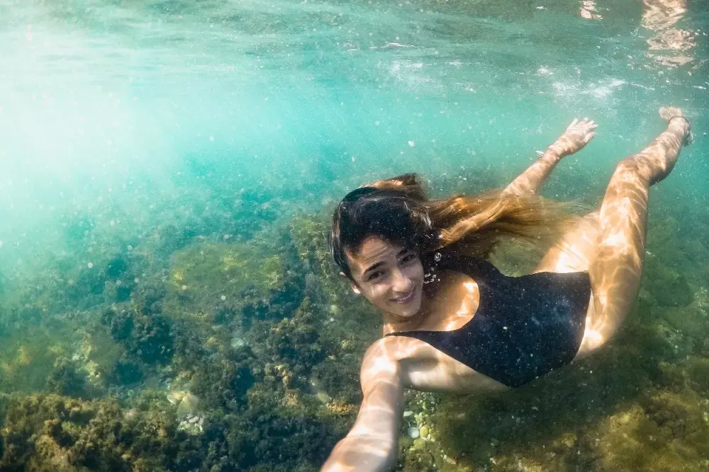 Woman swimming underwater in Islamorada